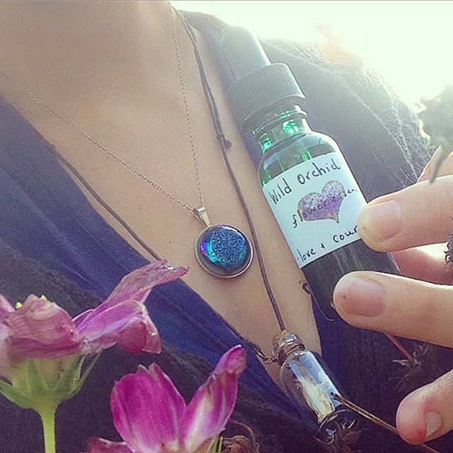 Headed to my marketing job this am - woke up with intense anxiety. Had to take a breather and also a minute with these wonderful flower essences and Hawaiian orchid necklace from @honestowlherbal . Wow - the energy I received from her package took me back. I'm so grateful for this rescue this am - goodbye anxiety - hello world! Also I have this eclipse piece on by @emmyeffdesigns grateful for the flowers still blooming. Never stop blooming! Have a good Friday my friends!